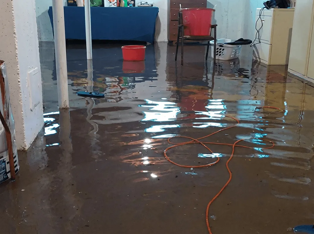 Basement with boiler, cabinets and washing machine completely flooded in Jackson, MS